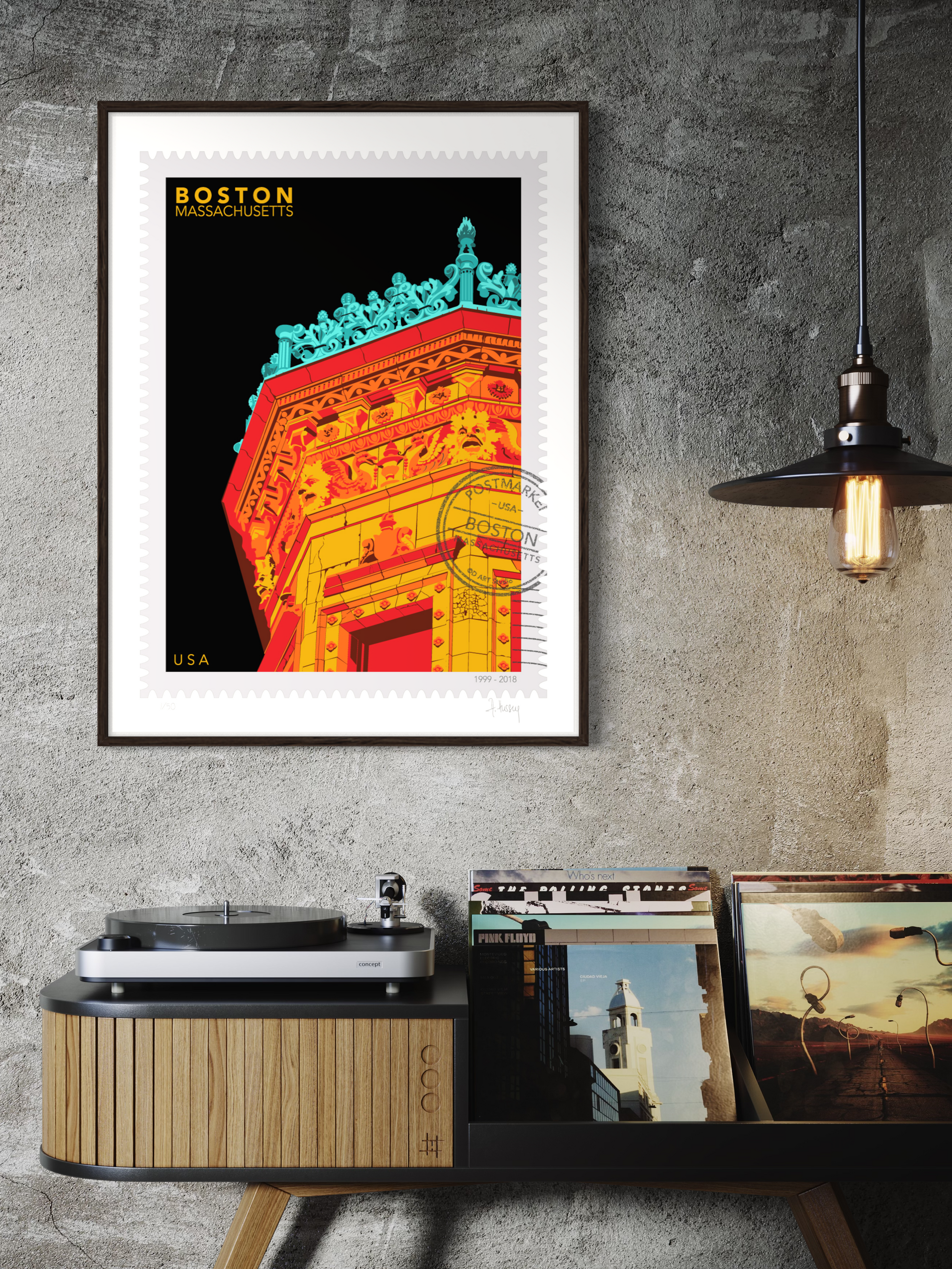 Drawing of the Proctor Building crowned with decorative elements on a black background, featuring the text 'Boston, Massachusetts' and 'USA'. Large postage stamp art, postmarked with D ART Studio stamp. Ana Hussey art. Framed on a wall above a record player and records.