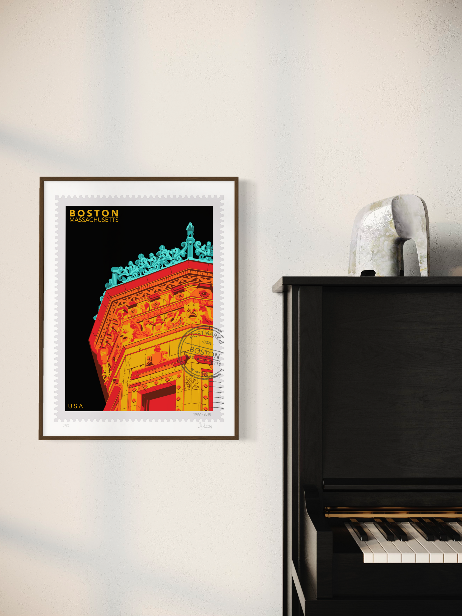 Drawing of the Proctor Building crowned with decorative elements on a black background, featuring the text 'Boston, Massachusetts' and 'USA'. Large postage stamp art, postmarked with D ART Studio stamp. Ana Hussey art. Framed on a wall next to a piano