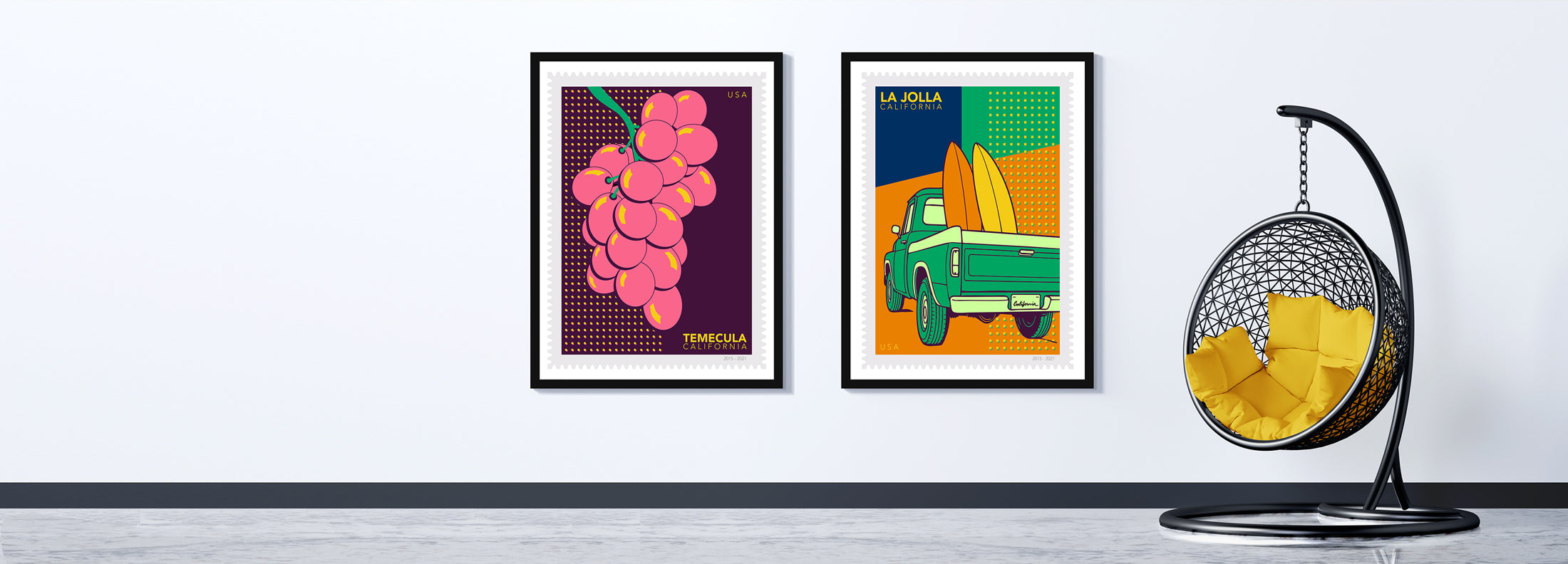 Two colorful framed D ART Studio artworks on a wall with a hanging chair below.