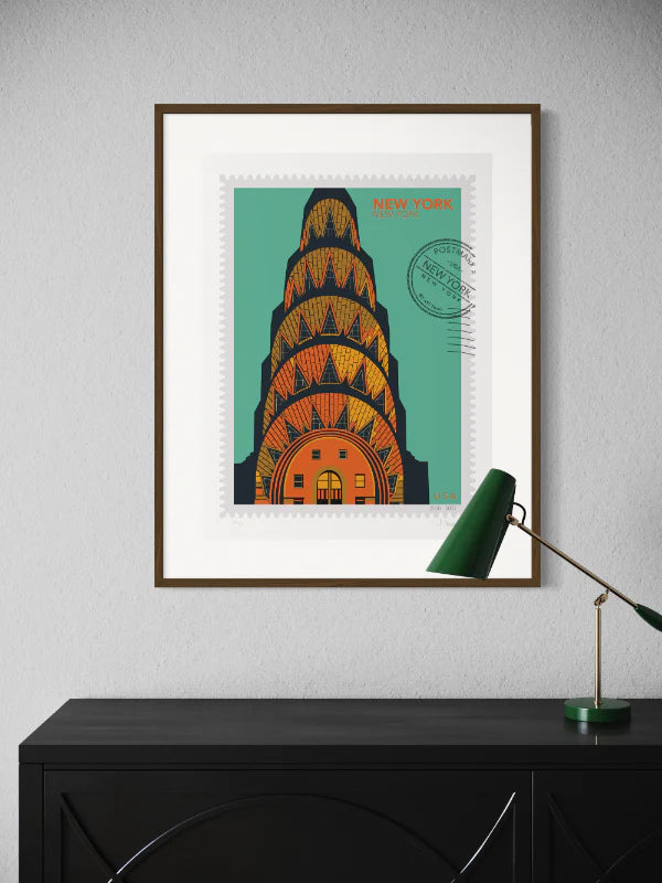 Drawing of the Chrysler Building with geometric patterns on a green background, in a large size, New York oversized postage stamp. Framed on a wall. Ana Hussey art.
