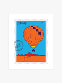 Bright colors drawing of a Phoenix hot-air-balloon ride, floating above the Phoenix desert in this large postage-stamp drawing. Drawing includes words Phoenix Arizona and postmark. Ana Hussey art.